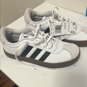 Adidas kids brand new with tags. Outgrew her shoes. White and Black Sneakers